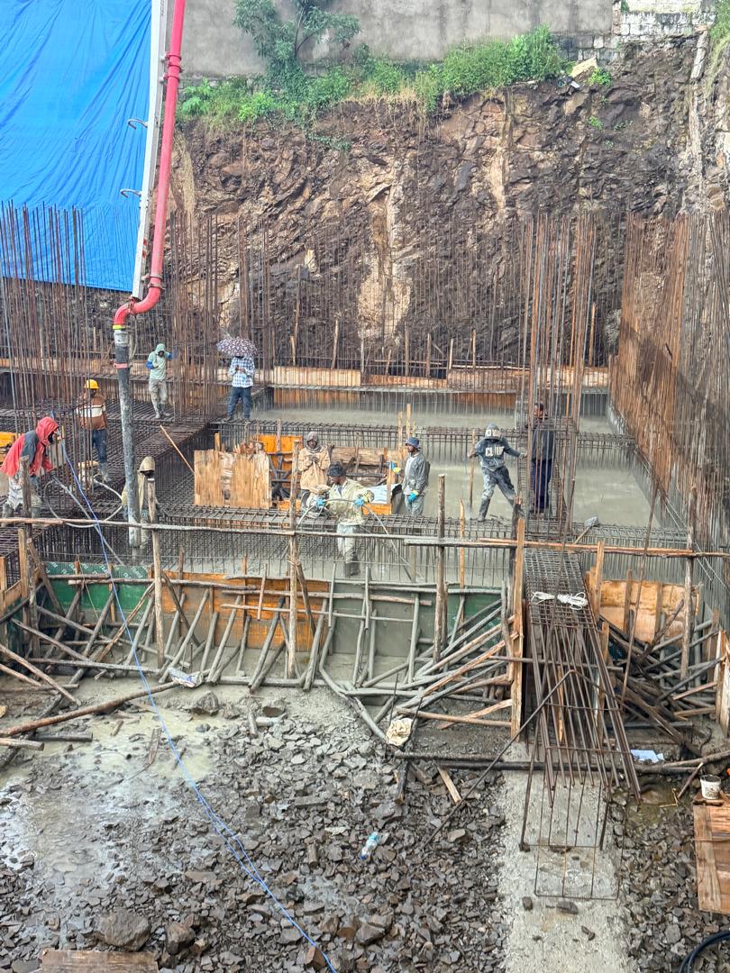 Workers carrying out basement concrete works